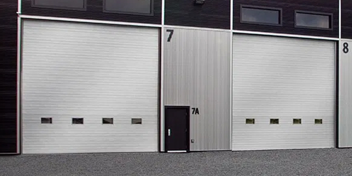 fix bent garage door in West Vancouver